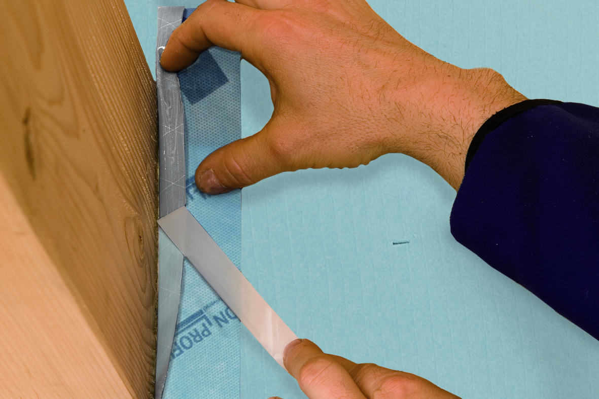 Band auf Trennfolie in die Ecke schieben, verkleben